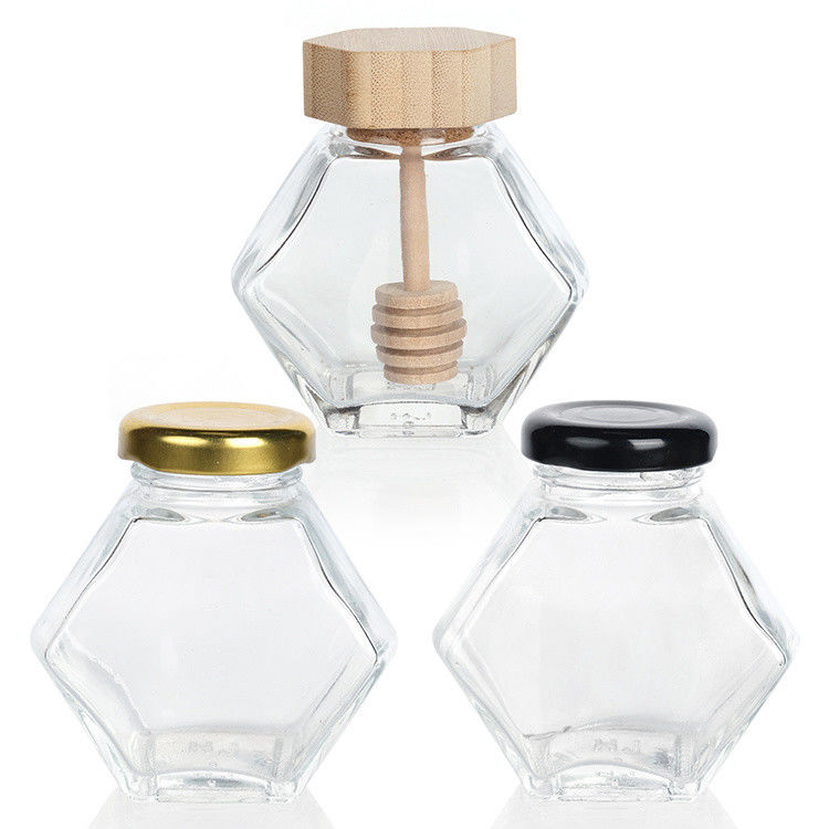 Hexagonal espessado Transparente armazenamento de alimentos de diferentes tamanhos frascos de vidro de mel com tampa de metal selada