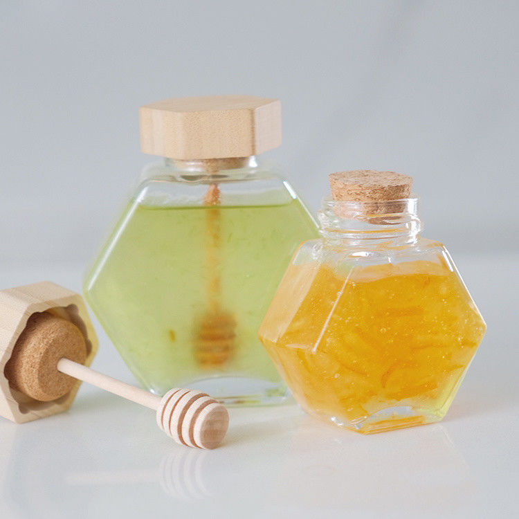 Hexagonal espessado Transparente armazenamento de alimentos de diferentes tamanhos frascos de vidro de mel com tampa de metal selada