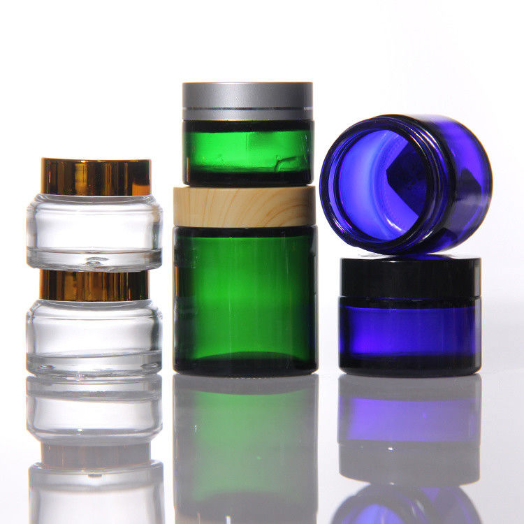 ODM Cosméticos coloridos frascos de creme de vidro com tampa de acacia dourada
