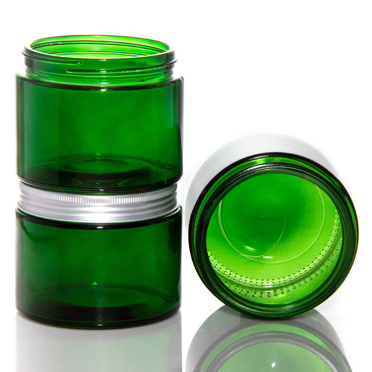 Jarros de velas de vidro transparente de cor verde vazia com tampa ODM