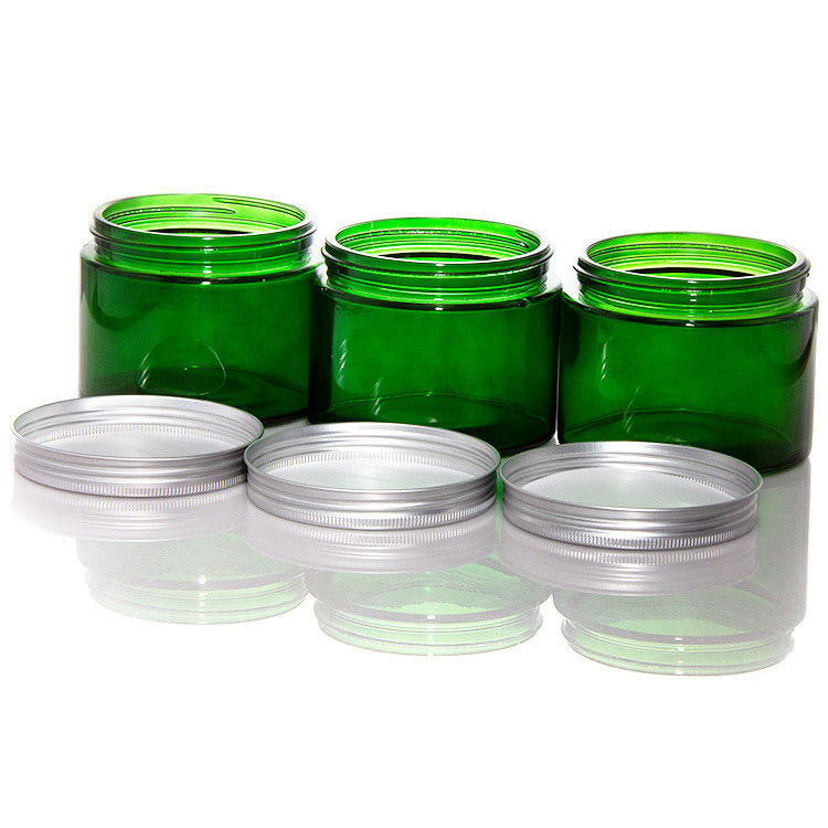 Jarros de velas de vidro transparente de cor verde vazia com tampa ODM