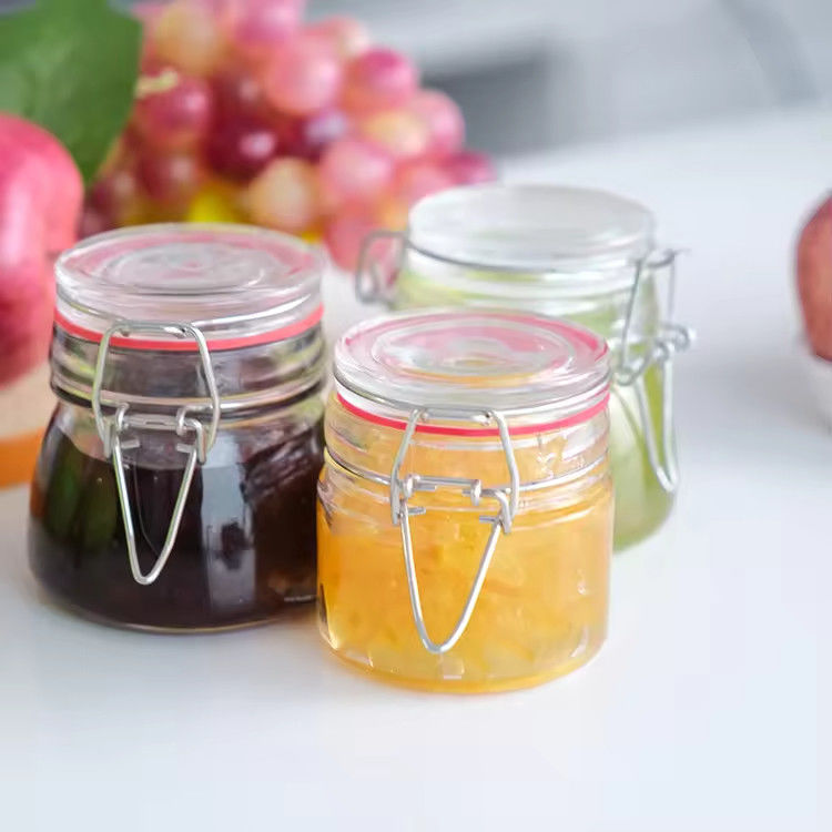 Popular Gráfico 100ml 180ml 280ml Grado Alimentar Jar de vidro redondo de mel com tampa de clipe