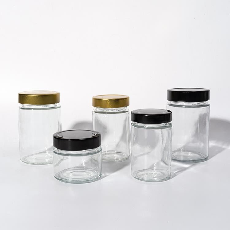 Fabrica de alimentos Utilização 1 oz 4 oz 8 oz Forma redonda recipiente de armazenamento vazio transparente vidro gelatina doce de mel molho Jar