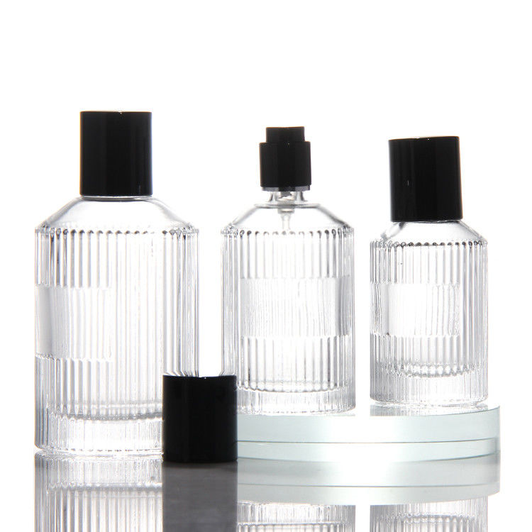 Garrafa de perfume transparente de cilindro OEM Garrafa de perfume de vidro de 50 ml com caixa de presente Pulverizador de bomba