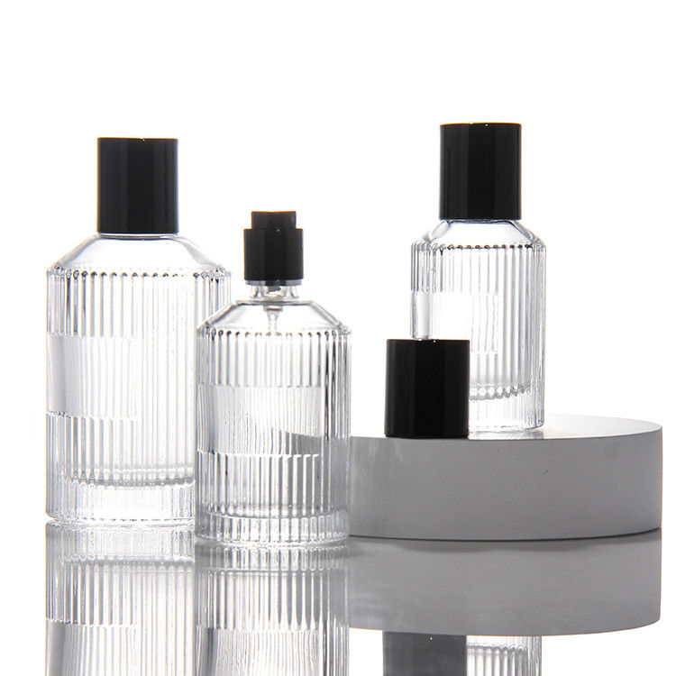 Garrafa de perfume transparente de cilindro OEM Garrafa de perfume de vidro de 50 ml com caixa de presente Pulverizador de bomba
