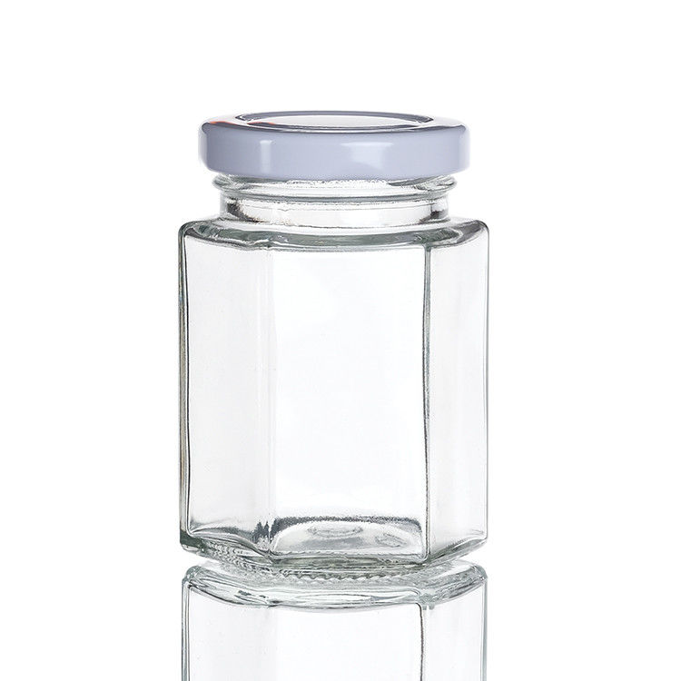 Jarros de garrafas claros com tampas Jarros de armazenamento de vidro hexagonal para latas de chá